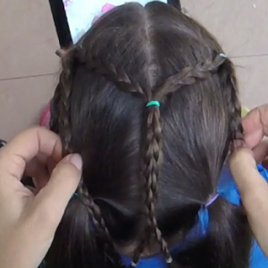 dos coletas con trenzas